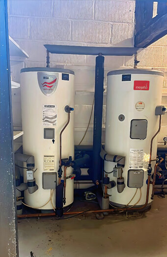 https://mountlawleyhotwater.com.au/uploads/2025/06/electric-hot-water-system-10198.jpg